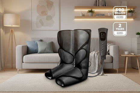 Black foot massager with control panel on a teal background