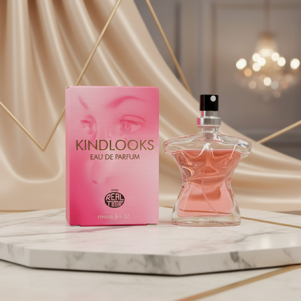 Pink perfume bottle and packaging with 'KindLooks' branding on a white background
