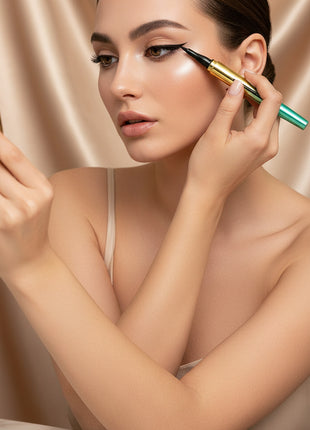 L'Oreal Quick Dry liquid eyeliner pen with packaging on a white background