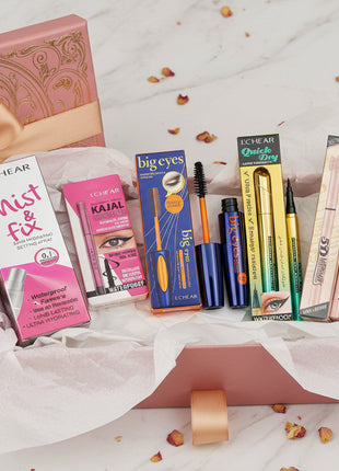 Collection of L'Chear eye makeup products including mascara, eyeliner, and setting spray on a white background.