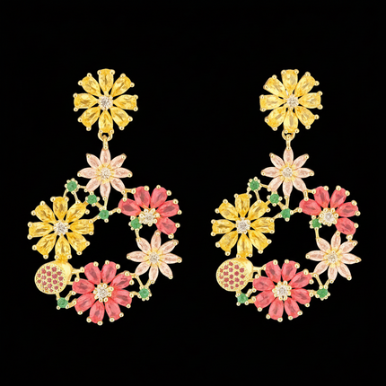 Colorful floral earrings on a white background