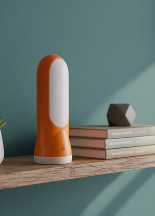 Orange and white portable light on a white background