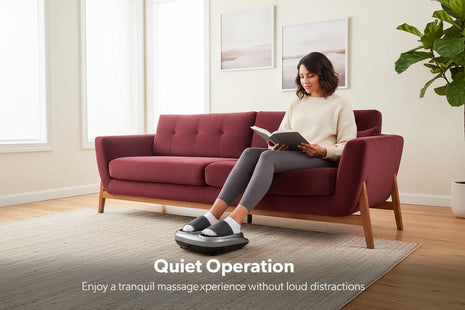Woman using a foot massager in a living room with text 'Quiet Operation'.
