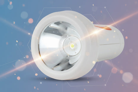 Close-up of a flashlight on a white background