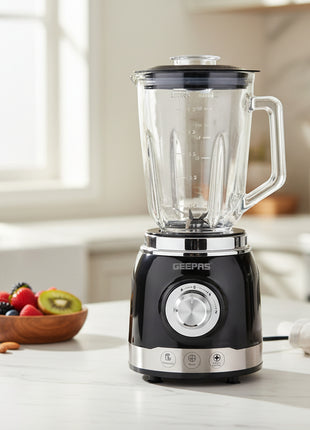 Black blender with clear jar on a white background