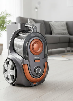 Gray and orange vacuum cleaner on a white background