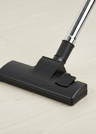 Black vacuum cleaner head on a white background