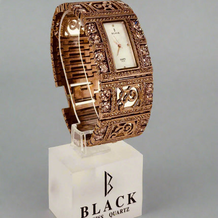 Decorative watch on a stand with 'Black Swiss Quartz' branding