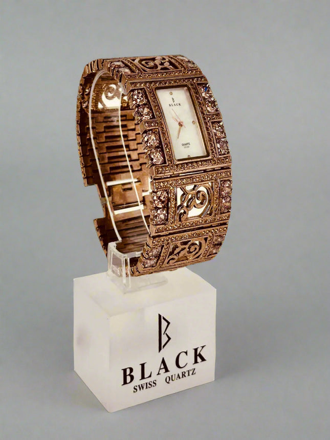 Decorative watch on a stand with 'Black Swiss Quartz' branding