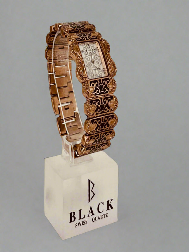 Decorative watch on a stand with 'Black Swiss Quartz' branding
