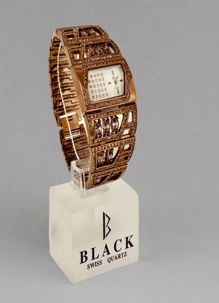 Decorative watch on a stand with 'Black Swiss Quartz' branding