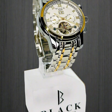 Luxury watch with a metallic band on a white background, featuring the brand 'Black'.