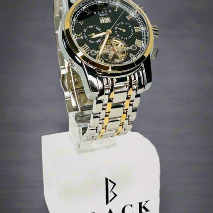 Two-tone watch on a white background with 'Black Swiss Quartz' branding.