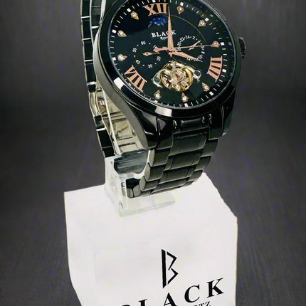 Black Swiss Quartz watch on a white background
