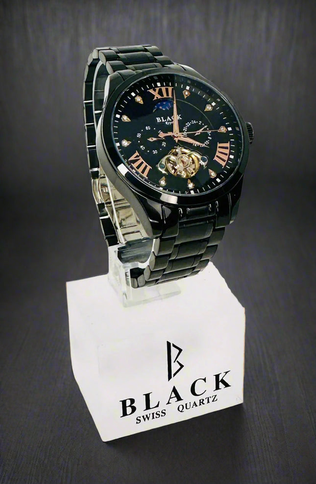 Black Swiss Quartz watch on a white background
