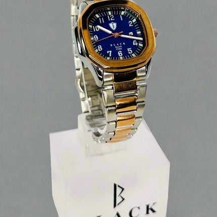 Two-tone watch with blue face on a white background, featuring the brand 'Black Swiss Quartz'.