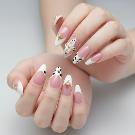 Close-up of hands with stylish nail art on a light background