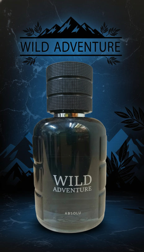 Bottle of 'Wild Adventure' Absolu with mountain and leaf design on a dark background
