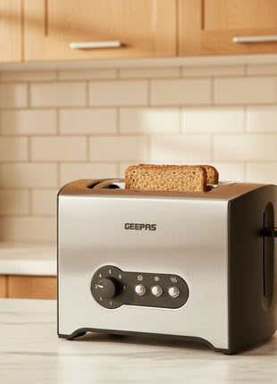 Stainless steel toaster with GEEPAS branding on a white surface.