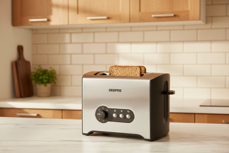 Stainless steel toaster with GEEPAS branding on a white surface.