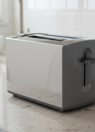 Gray toaster with black interior on a white background