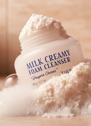 Jar of Milk Creamy Foam Cleanser with text on a white background