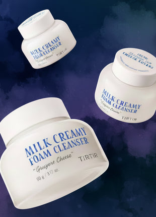 Three containers of Milk Creamy Foam Cleanser by TIRTIR on a white background